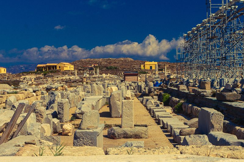 Ancient ruins scattered across the small island of Delos, Greece.