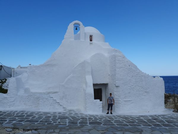 The irregular whitewashed domes of Panagia Paraportiani church in Mykonos town at dawn