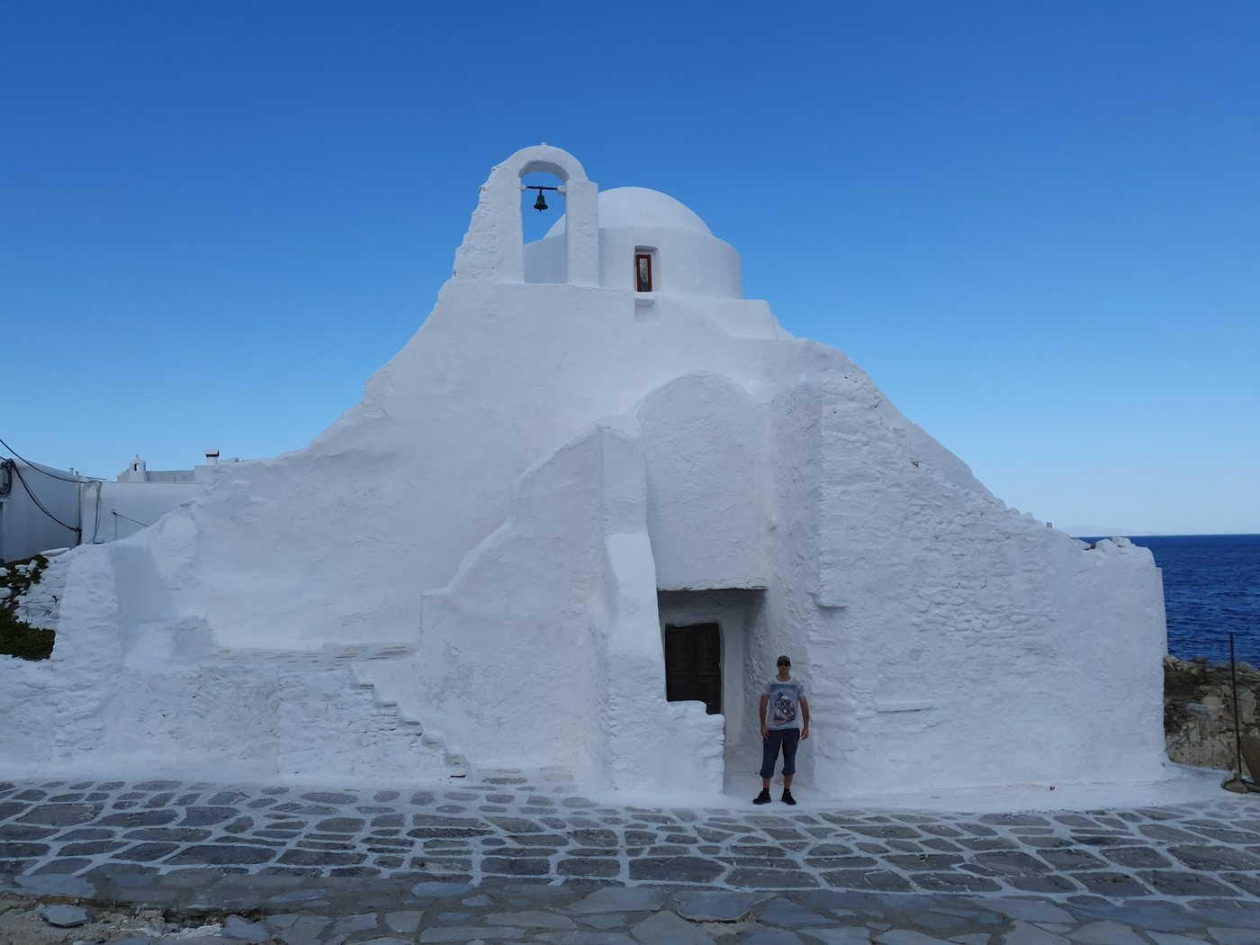 The irregular whitewashed domes of Panagia Paraportiani church in Mykonos town at dawn
